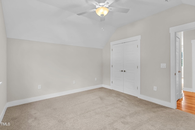 5107 Overhill St, Raleigh, NC 27603 - unfurnished bedroom with lofted ceiling, carpet flooring, a closet, and a ceiling fan