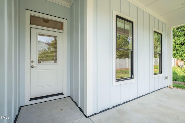 5107 Overhill St, Raleigh, NC 27603 - property entrance featuring board and batten siding and covered porch