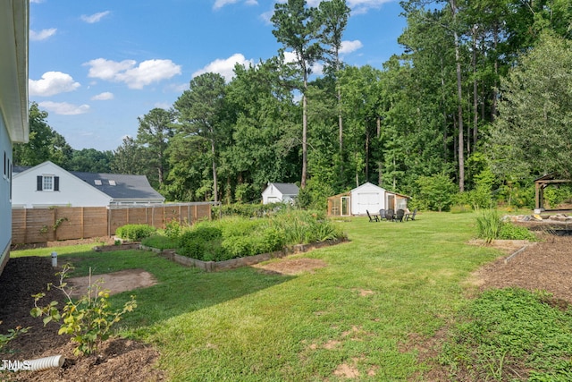 5107 Overhill St, Raleigh, NC 27603 - view of yard featuring a storage shed
