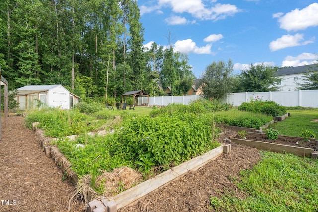 5107 Overhill St, Raleigh, NC 27603 - view of yard featuring a garden, a gazebo, and a shed