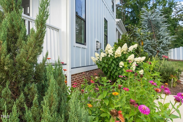 5107 Overhill St, Raleigh, NC 27603 - view of side of property featuring board and batten siding
