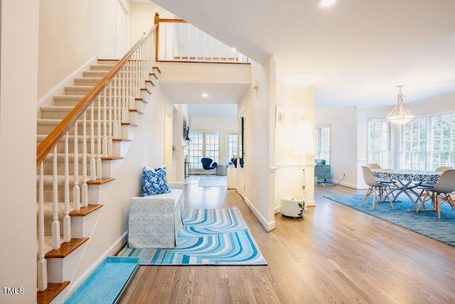10 Marchmont Ct, Durham, NC 27705 - entrance foyer with wood finished floors, stairway, plenty of natural light, and recessed lighting
