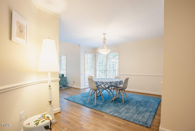 10 Marchmont Ct, Durham, NC 27705 - dining space featuring wood finished floors and crown molding