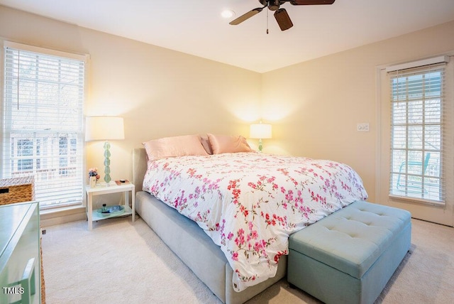 10 Marchmont Ct, Durham, NC 27705 - bedroom featuring light carpet, multiple windows, and a ceiling fan