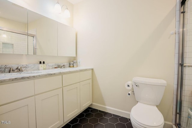 10 Marchmont Ct, Durham, NC 27705 - bathroom featuring double vanity, tile patterned flooring, and tiled shower