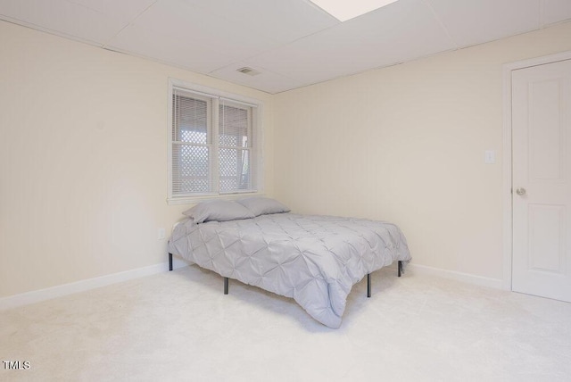 10 Marchmont Ct, Durham, NC 27705 - carpeted bedroom with baseboards and a paneled ceiling