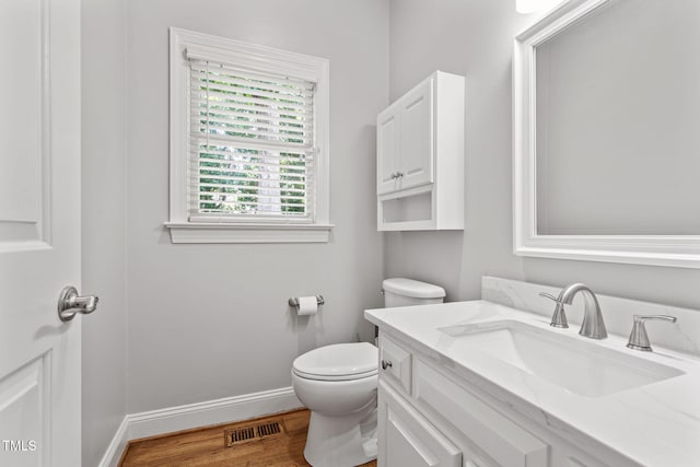 202 Stoneleigh Dr, Cary, NC 27511 - half bath with vanity and wood finished floors
