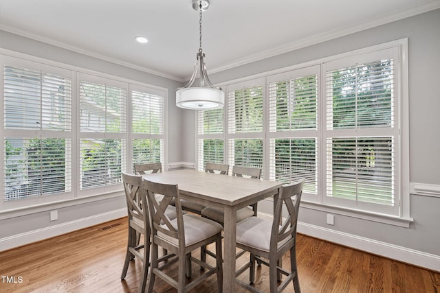 202 Stoneleigh Dr, Cary, NC 27511 - dining area with wood finished floors and ornamental molding