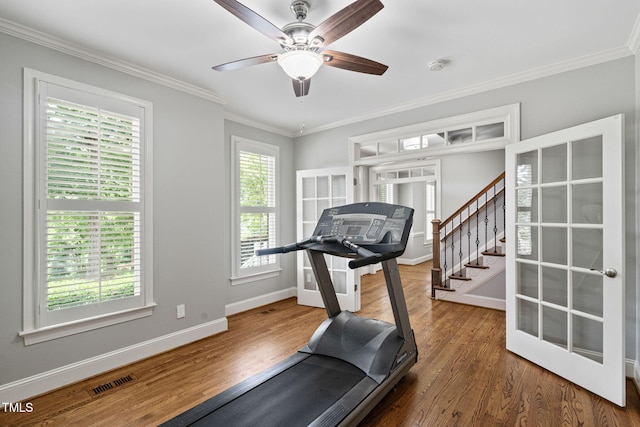 202 Stoneleigh Dr, Cary, NC 27511 - exercise area featuring wood finished floors, crown molding, and ceiling fan