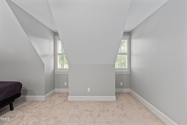 202 Stoneleigh Dr, Cary, NC 27511 - bedroom featuring multiple windows, lofted ceiling, and carpet floors