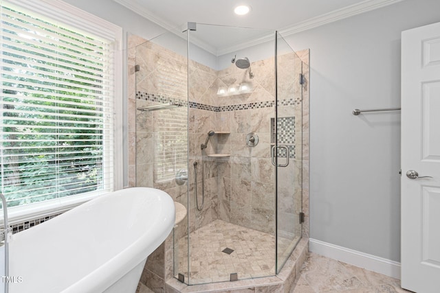 202 Stoneleigh Dr, Cary, NC 27511 - bathroom featuring a freestanding bath, crown molding, and a stall shower