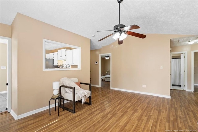 3820 Crusader Dr, Hope Mills, NC 28348 - sitting room featuring a ceiling fan, wood finished floors, and a textured ceiling