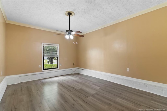 3820 Crusader Dr, Hope Mills, NC 28348 - empty room featuring crown molding, a textured ceiling, a ceiling fan, and wood finished floors