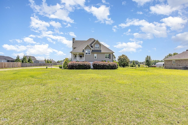 656 Atkins Rd, Fuquay Varina, NC 27526 - rear view of house featuring a chimney