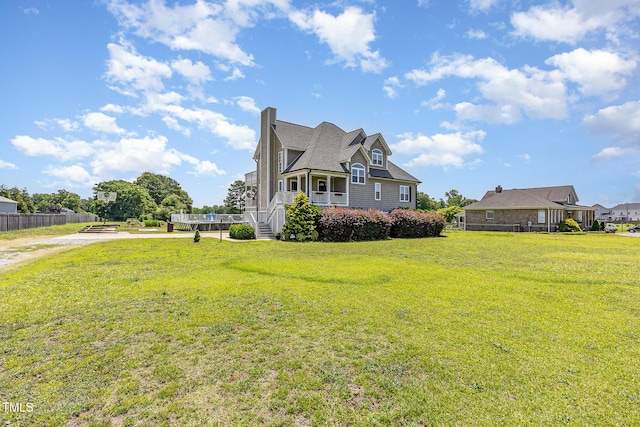 656 Atkins Rd, Fuquay Varina, NC 27526 - view of property exterior with a chimney