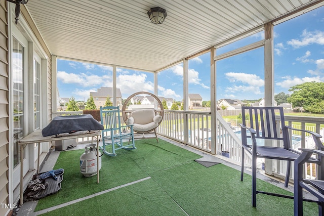 656 Atkins Rd, Fuquay Varina, NC 27526 - sunroom / solarium with healthy amount of natural light and a residential view