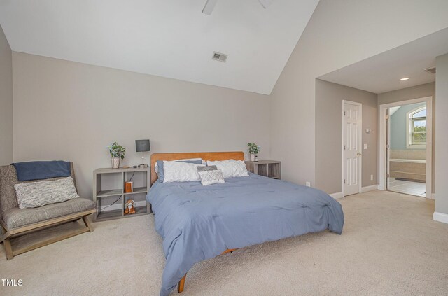 656 Atkins Rd, Fuquay Varina, NC 27526 - carpeted bedroom featuring vaulted ceiling, ensuite bathroom, and a ceiling fan