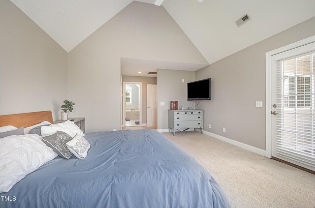 656 Atkins Rd, Fuquay Varina, NC 27526 - bedroom featuring high vaulted ceiling, carpet, multiple windows, and ensuite bathroom