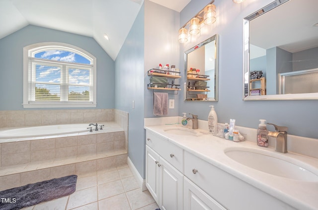 656 Atkins Rd, Fuquay Varina, NC 27526 - full bathroom featuring tile patterned floors, a garden tub, vaulted ceiling, double vanity, and a shower with door