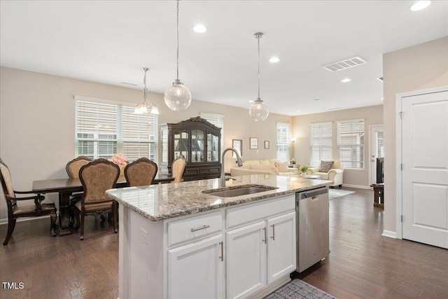 1416 Southpoint Trl, Durham, NC 27713 - kitchen with dishwasher, dark wood-style flooring, healthy amount of natural light, a center island with sink, and recessed lighting