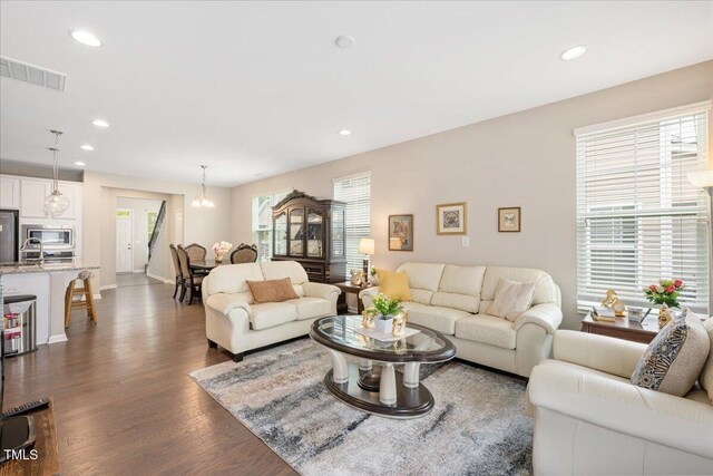 1416 Southpoint Trl, Durham, NC 27713 - living area featuring dark wood-style flooring and recessed lighting
