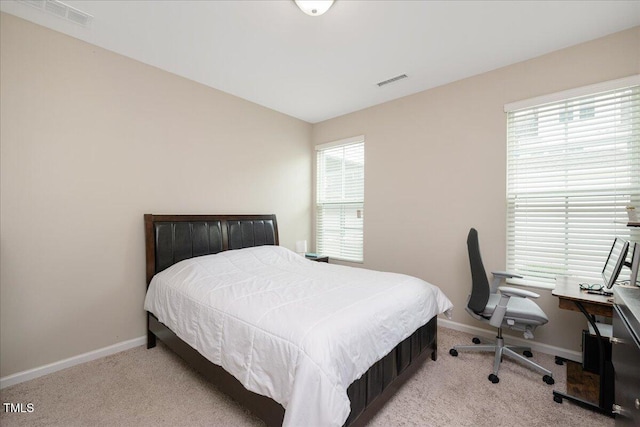 1416 Southpoint Trl, Durham, NC 27713 - carpeted bedroom with baseboards