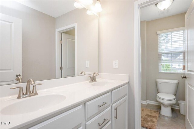 1416 Southpoint Trl, Durham, NC 27713 - full bathroom featuring double vanity and tile patterned floors