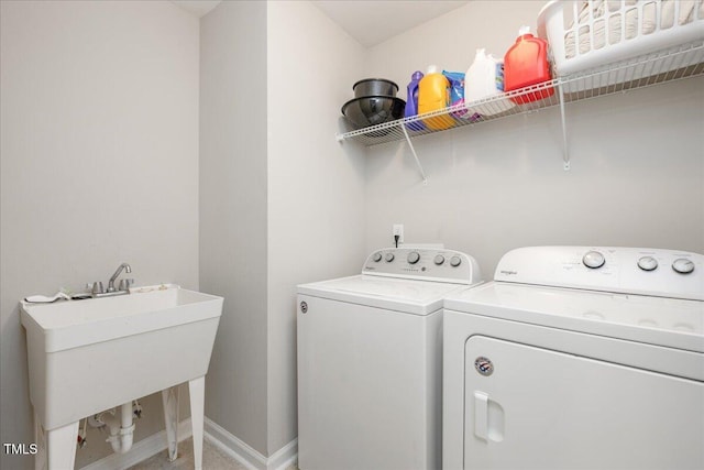 1416 Southpoint Trl, Durham, NC 27713 - laundry area featuring washer and clothes dryer and baseboards