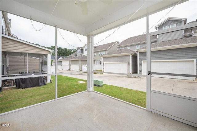 1416 Southpoint Trl, Durham, NC 27713 - unfurnished sunroom with a ceiling fan and a residential view