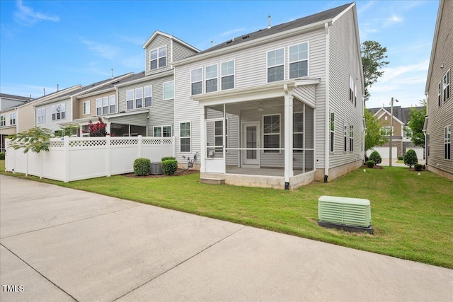 1416 Southpoint Trl, Durham, NC 27713 - rear view of house with a sunroom and a residential view