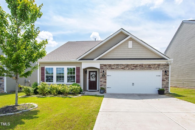 202 E Painted Way, Clayton, NC 27527 - view of front facade featuring driveway, a front lawn, an attached garage, and stone siding