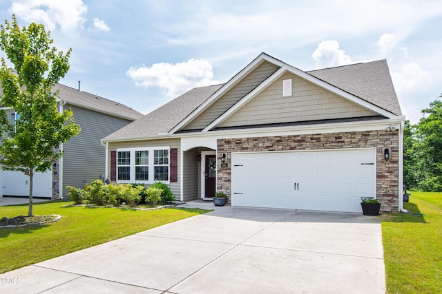 202 E Painted Way, Clayton, NC 27527 - view of front of house featuring driveway, a front lawn, a shingled roof, and an attached garage