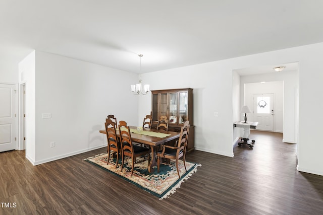 202 E Painted Way, Clayton, NC 27527 - dining room with a chandelier and dark wood-style flooring