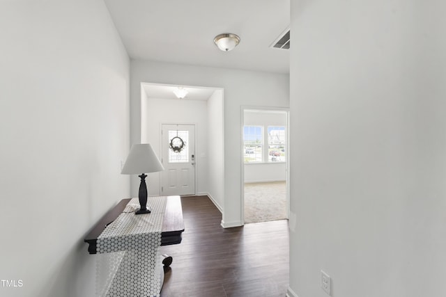 202 E Painted Way, Clayton, NC 27527 - hall featuring dark wood-type flooring and baseboards