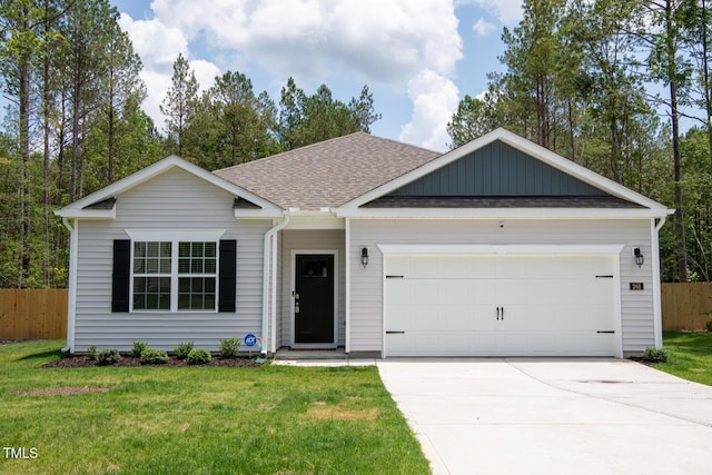 248 Hawksmoore Ln, Lillington, NC 27546 - ranch-style home with a garage, roof with shingles, and concrete driveway