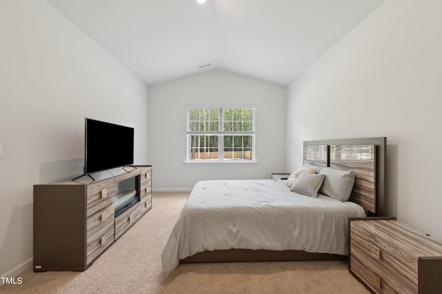 248 Hawksmoore Ln, Lillington, NC 27546 - bedroom featuring lofted ceiling and light colored carpet