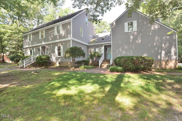2708 Coleberry Trl, Rocky Mount, NC 27804 - view of front of property featuring a front yard and roof with shingles
