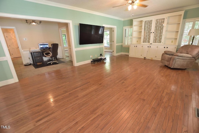 2708 Coleberry Trl, Rocky Mount, NC 27804 - living area featuring crown molding, hardwood / wood-style floors, ceiling fan, and an office area