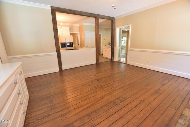 2708 Coleberry Trl, Rocky Mount, NC 27804 - spare room featuring ornamental molding and dark wood-style flooring