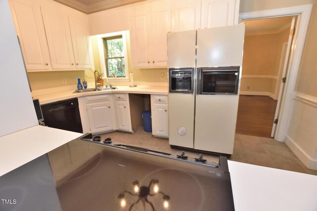 2708 Coleberry Trl, Rocky Mount, NC 27804 - kitchen featuring white refrigerator with ice dispenser, dishwasher, white cabinets, crown molding, and light tile patterned flooring