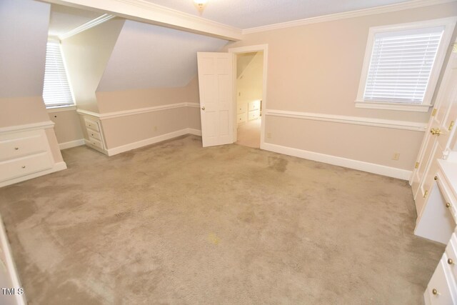 2708 Coleberry Trl, Rocky Mount, NC 27804 - unfurnished bedroom with crown molding, light carpet, and vaulted ceiling
