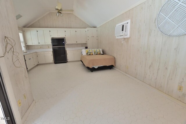 2708 Coleberry Trl, Rocky Mount, NC 27804 - bedroom featuring fridge, a wall mounted AC, lofted ceiling, and wood walls