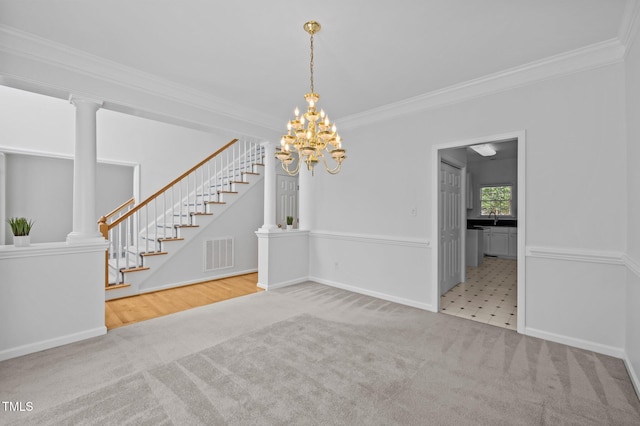 8 Summertime Ct, Durham, NC 27707 - unfurnished dining area featuring carpet flooring, stairway, ornamental molding, and a chandelier