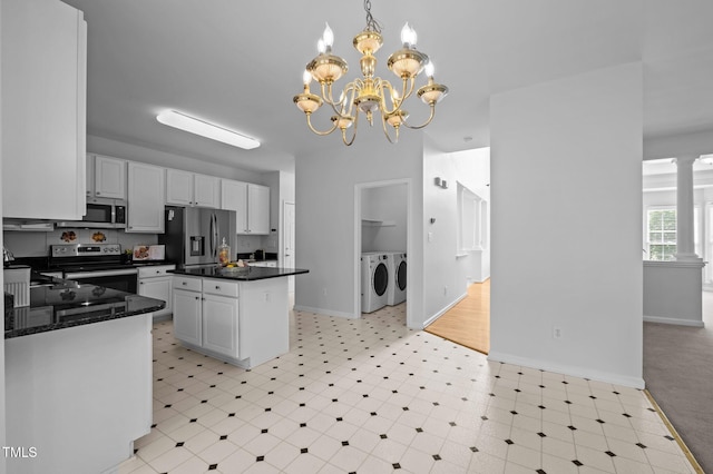 8 Summertime Ct, Durham, NC 27707 - kitchen with separate washer and dryer, stainless steel appliances, light floors, a chandelier, and white cabinetry