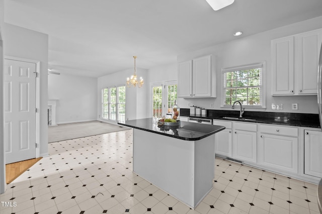8 Summertime Ct, Durham, NC 27707 - kitchen with plenty of natural light, white cabinetry, dark countertops, and recessed lighting