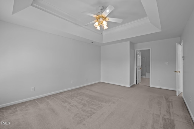 8 Summertime Ct, Durham, NC 27707 - spare room featuring a raised ceiling, carpet, ceiling fan, and crown molding