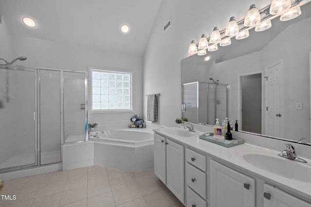 8 Summertime Ct, Durham, NC 27707 - full bathroom with a shower stall, double vanity, lofted ceiling, a bath, and tile patterned floors