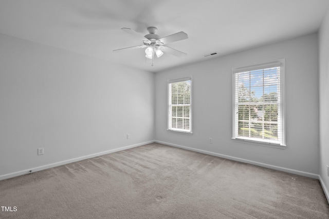8 Summertime Ct, Durham, NC 27707 - carpeted spare room with baseboards and a ceiling fan