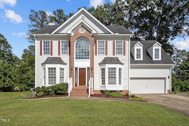 8 Summertime Ct, Durham, NC 27707 - view of front of home with concrete driveway, a front yard, entry steps, a shingled roof, and an attached garage