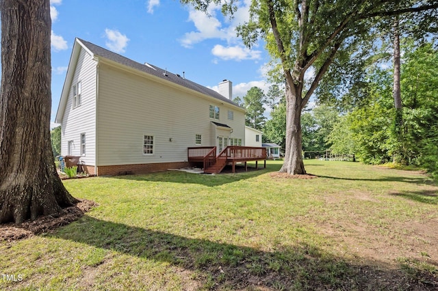 8 Summertime Ct, Durham, NC 27707 - rear view of house featuring a chimney, a deck, and a lawn
